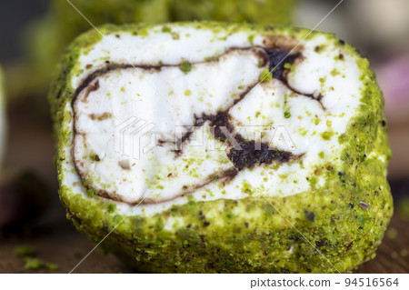 Oriental sweetness Turkish delight with pistachios and chocolate 94516564