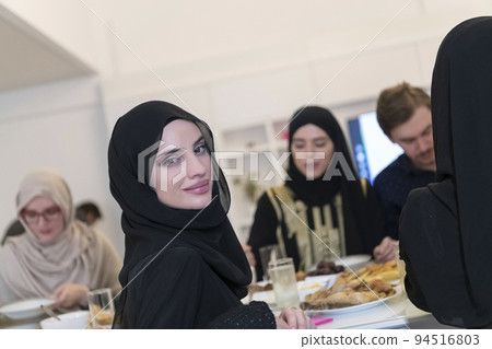Muslim family making iftar dua to break fasting during Ramadan. Muslim family making iftar dua to break fasting during Ramadan. 94516803