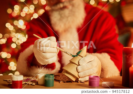 Santa Claus Making Toys 94517812