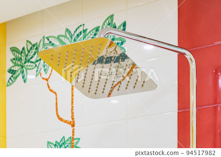 Shower head with water spray of the bathroom. 94517982