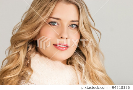Autumn winter fashion and knitwear, beautiful woman wearing warm knitted scarf, close-up portrait Autumn winter fashion and knitwear, beautiful woman wearing warm knitted scarf, close-up portrait 94518356