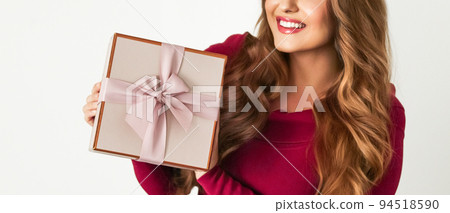 Birthday, Christmas or holiday present, happy woman holding a green gift or luxury beauty box subscription delivery isolated on white background, portrait 94518590