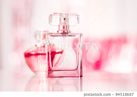 Perfume bottles on glamour background, floral feminine scent, fragrance and eau de parfum as luxury holiday gift, cosmetic and beauty brand present concept 94518687