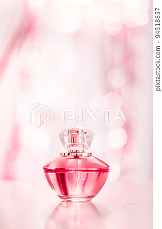 Perfume bottle on glamour background, floral feminine scent, fragrance and eau de parfum as luxury holiday gift, cosmetic and beauty brand present concept 94518857