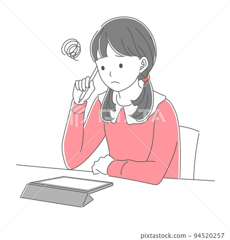 一個在平板電腦上學習的表情困擾的女學生 94520257