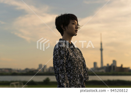 evening riverbed short hair woman 94520812