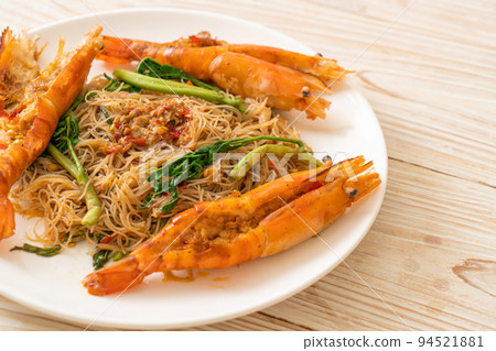Stir-fried rice vermicelli and water mimosa with river prawns 94521881