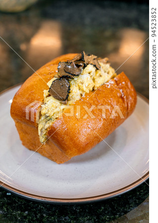 bread with scrambled eggs and truffle mushroom bread with scrambled eggs and truffle mushroom 94523852