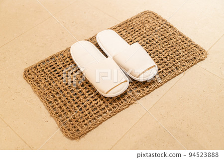 Slipper in hotel bedroom 94523888
