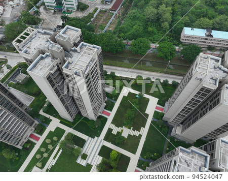 Aerial view of multistory apartment construction site in China Aerial view of multistory apartment construction site in China 94524047
