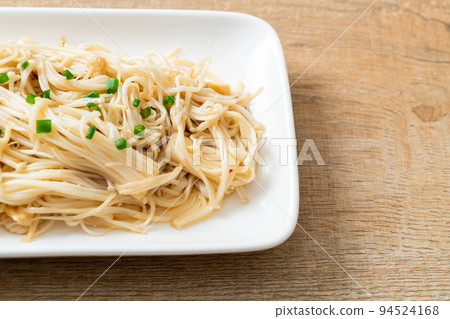 stir-fried golden needle mushroom with butter stir-fried golden needle mushroom with butter 94524168