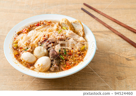 noodles with pork and meatballs in spicy soup noodles with pork and meatballs in spicy soup 94524460