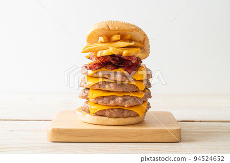 pork burger with cheese, bacon and french fries pork burger with cheese, bacon and french fries 94524652