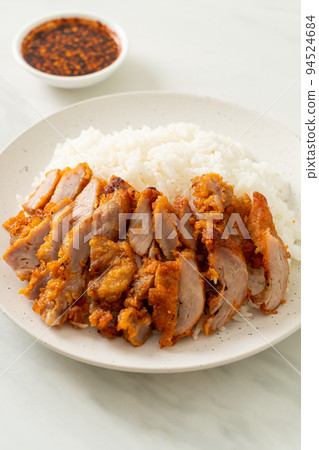 fried pork topped rice with dipping sauce fried pork topped rice with dipping sauce 94524684