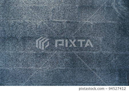 Vintage wall covered with gray decorative plaster, grungy Vintage wall covered with gray decorative plaster, grungy 94527412