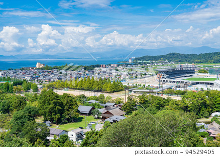 A bird's-eye view of the city from Hikone Castle, Shiga Prefecture A bird's-eye view of the city from Hikone Castle, Shiga Prefecture 94529405