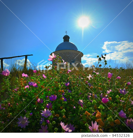 South Moravia - wine region. A beautiful little chapel above the vineyards. Summer landscape with nature in the Czech Republic. (Hradistek - Velke Bilovice) South Moravia - wine region. A beautiful little chapel above the vineyards. Summer landscape with nature in the Czech Republic. (Hradistek - Velke Bilovice) 94532326