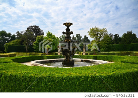 Lednice - South Moravia - Czech Republic. A beautiful park with a lake in the castle grounds. Landscape with nature in summer time. Lednice - South Moravia - Czech Republic. A beautiful park with a lake in the castle grounds. Landscape with nature in summer time. 94532331
