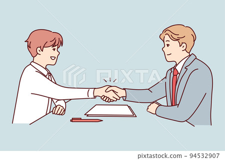 Smiling businessmen handshake closing deal Smiling businessmen handshake closing deal 94532907