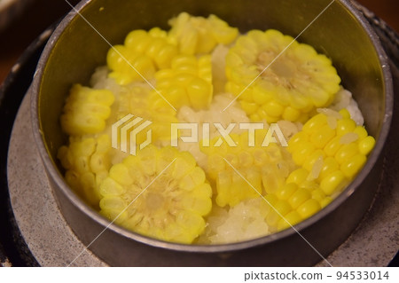 Rice cooked with corn Rice cooked with corn 94533014