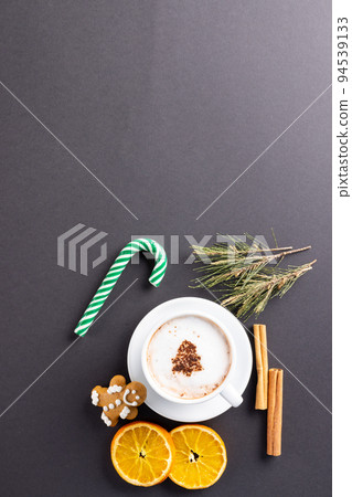 Image of cup of cappuccino coffee and christmas gingerbread man with copy space on grey Image of cup of cappuccino coffee and christmas gingerbread man with copy space on grey 94539133