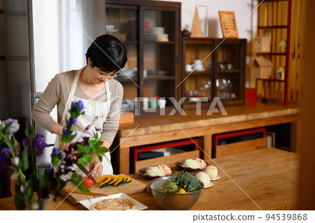 lovely mother who cooks 94539868