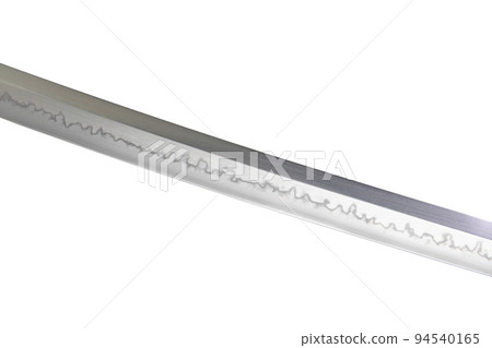 Japanese sword blade on white background. Soft focus. The wavy pattern on the blade edge is a line of hardness that a blacksmith makes so that the blade doesn't break. Choji Hamon style. Japanese sword blade on white background. Soft focus. The wavy pattern on the blade edge is a line of hardness that a blacksmith makes so that the blade doesn't break. Choji Hamon style. 94540165