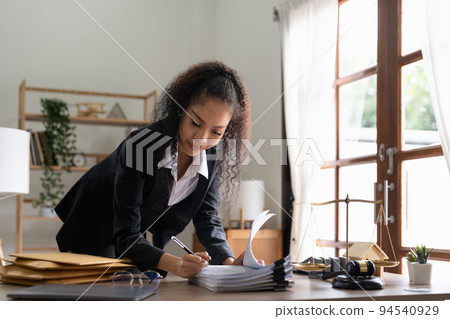 Judge gavel Justice lawyers, Business woman in suit or lawyer working on a documents. Legal law, advice and justice concept. 94540929