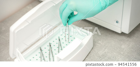 Hand disinfects tweezers with cleaning systems for medical instruments. Ultrasonic cleaner 94541556