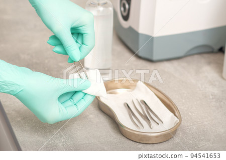 Hand disinfects tweezers with cleaning systems for medical instruments. Ultrasonic cleaner Hand disinfects tweezers with cleaning systems for medical instruments. Ultrasonic cleaner 94541653