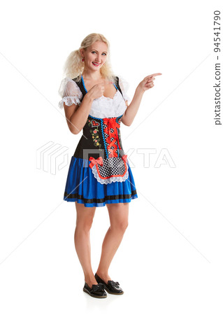 Beautiful young blond girl of oktoberfest beer stein 94541790
