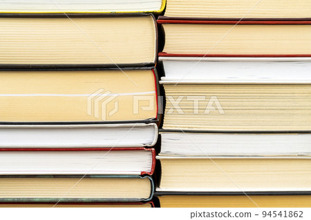 Hardback books on the bookshelf Hardback books on the bookshelf 94541862