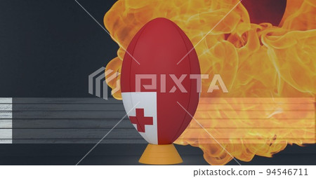 Composition of rugby ball decorated with the flag of tonga on black background with smoke 94546711