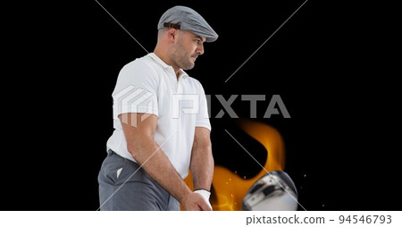 Composition of male golf player over flames on black background Composition of male golf player over flames on black background 94546793