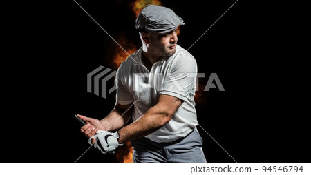 Composition of male golf player over flames on black background 94546794