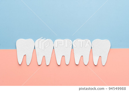 Healthy white tooth cartoon made from paper. Dental care concept. Healthy white tooth cartoon made from paper. Dental care concept. 94549988