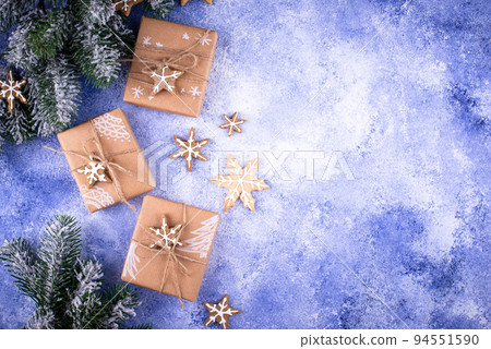 Christmas gift boxes on blue background 94551590