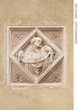 Biblical story, tile relief, external wall of Orsanmichele Church in Florence, Tuscany, Italy Biblical story, tile relief, external wall of Orsanmichele Church in Florence, Tuscany, Italy 94552340