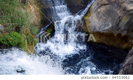 Beautiful unique landscape, mountain river, bay waterfall among the rocks, natural pools, SPA, Ontinyent, Spain 94553062