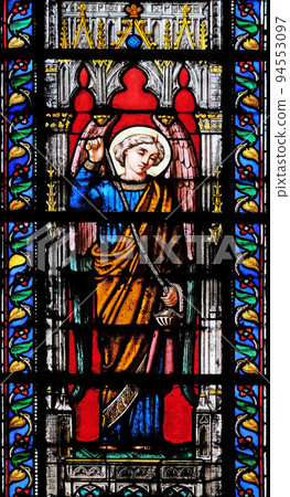 Angel, stained glass window in the Basilica of Saint Clotilde in Paris, France 94553097