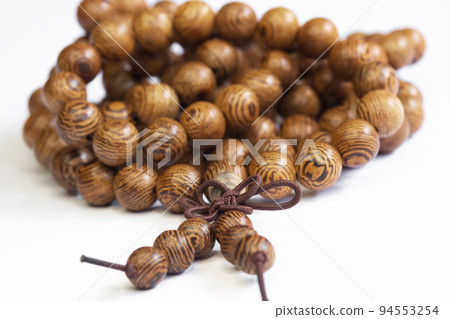 Selective focus beads made of wood. Selective focus beads made of wood. 94553254