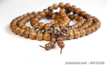 Selective focus beads made of wood. Selective focus beads made of wood. 94553260