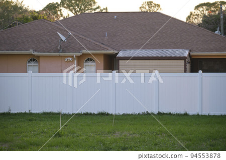 White plastic fence for back yard protection and privacy 94553878