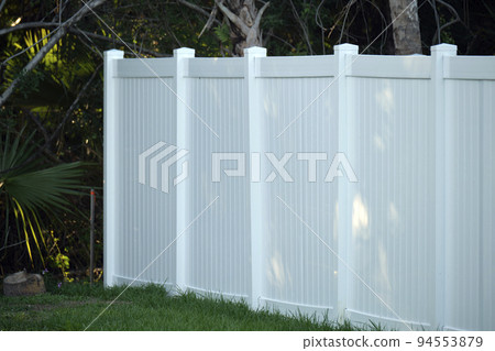 White plastic fence for back yard protection and privacy 94553879
