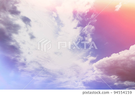 White clouds in bright sunlight. Revival of day. Clouds in glare of sun. White clouds in bright sunlight. Revival of day. Clouds in glare of sun. 94554159