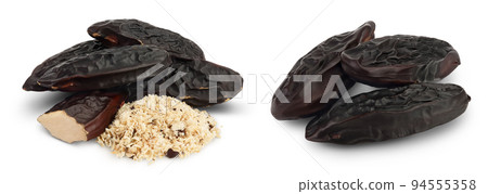 Tonka bean isolated on white background with full depth of field. Bean of Dipteryx odorata Tonka bean isolated on white background with full depth of field. Bean of Dipteryx odorata 94555358