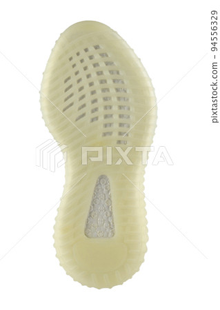 The polyurethane sole of the shoe is beige with white stripes. The polyurethane sole of the shoe is beige with white stripes. 94556329