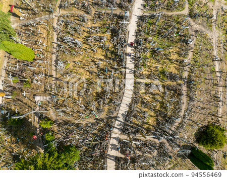 Aerial view of Hill of Crosses or KRYZIU KALNAS in Lithuania. It is a famous religious site of catholic pilgrimage in Lithuania 94556469