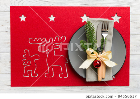 Christmas dinner background with rustic decorations and kitchen utensil . View from above Christmas dinner background with rustic decorations and kitchen utensil . View from above 94556617