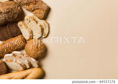 Homemade natural breads. Different kinds of fresh bread as background, top view with copy space 94557178
